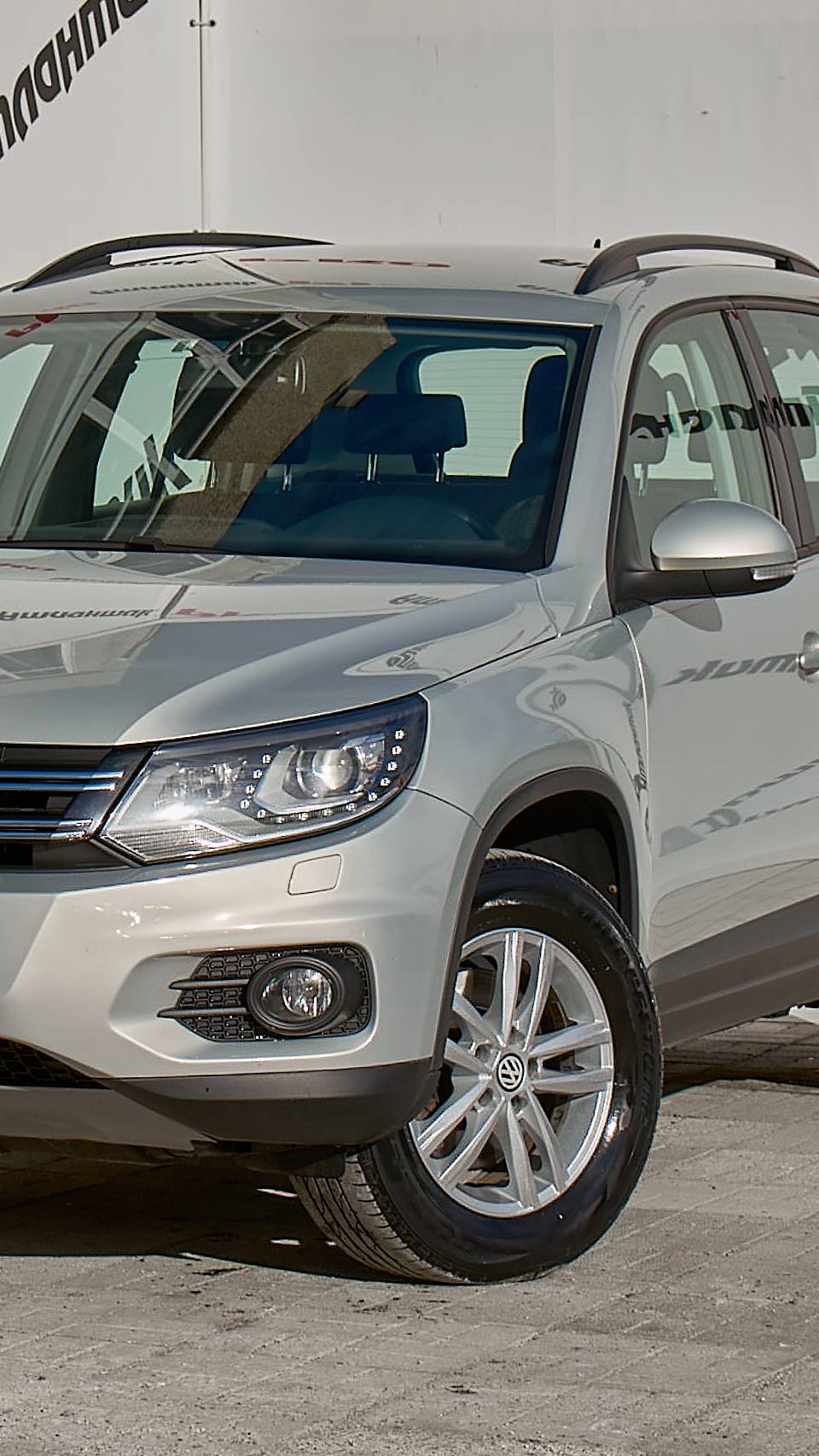 Обзор на Volkswagen Tiguan Кроссовер  2.0 AT 4WD 2013г