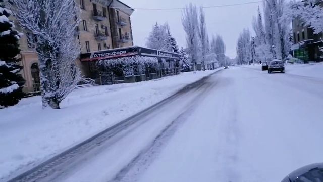 Славянск в снегу, любуемся красотой, слушаем песни
