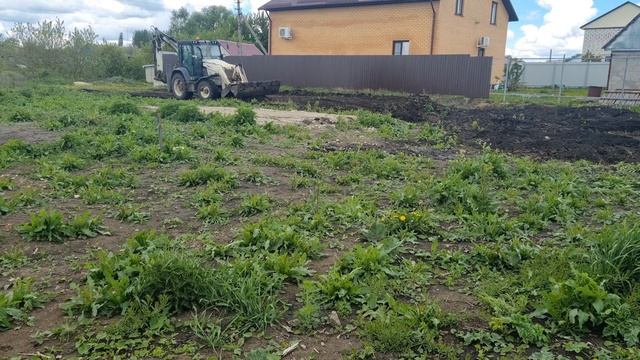 Планировка участка трактором TEREX