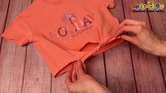 Футболка Lanson Kids с надписью Holiday и пайетками коралловая
