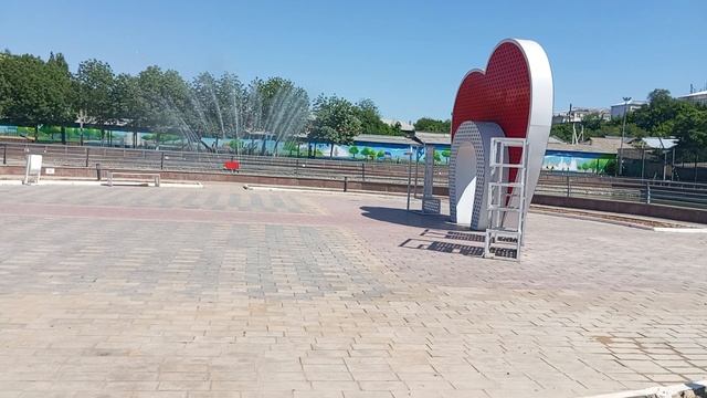 город