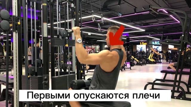 Вертикальная тяга широким хватом