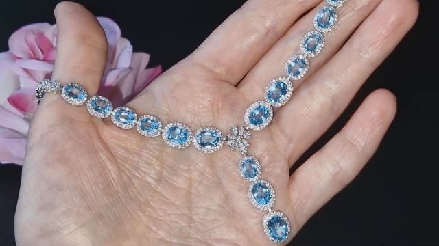 Серебряное колье с голубыми топазами