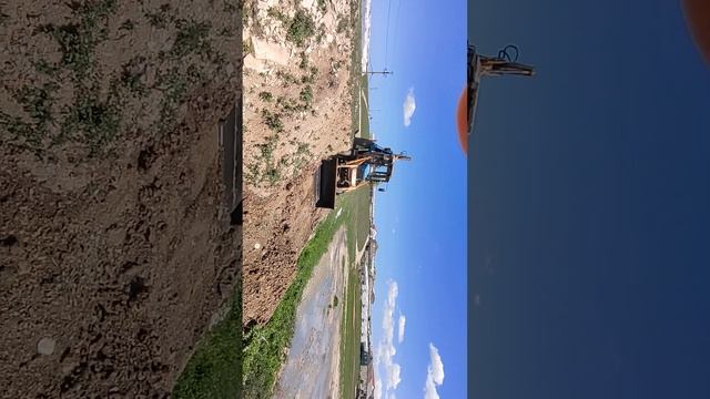 эксковатор погрузчик МТЗ 82.1 очистка проточной трубы 23