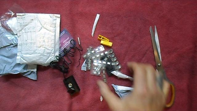 Распаковка трёх  пакетиков с алиэкспресс. Посмотрим что там.