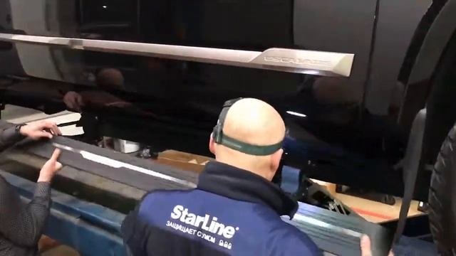 Установка автоматических выдвижных порогов на Cadillac Escalade