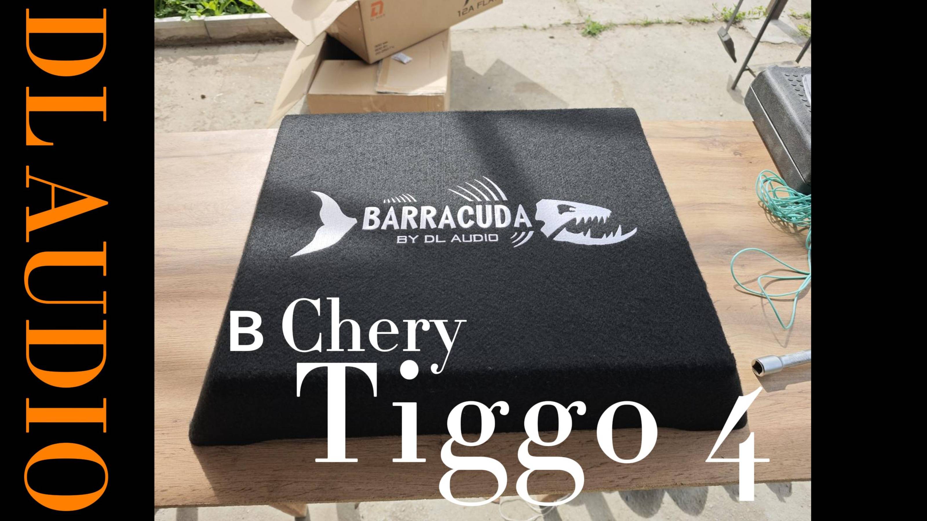 Установка активного сабвуфера DL Audio Barracuda 12A Flat в Chery Tiggo 4