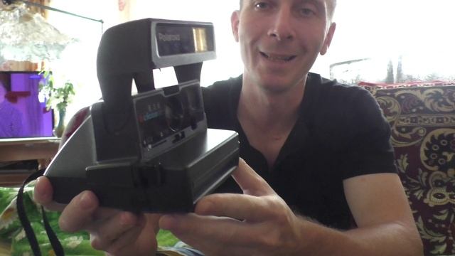 Как зарядить картридж в Polaroid фотоаппарат?