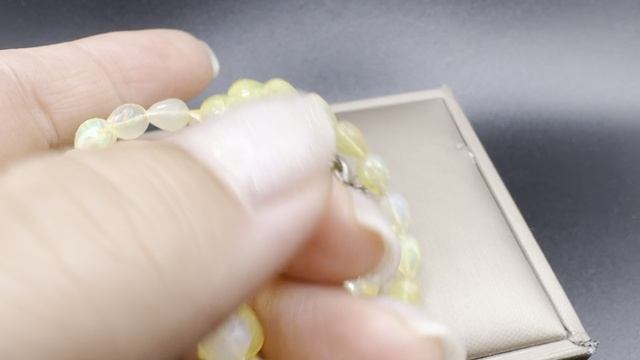 Эфиопский опал Колье  Длина 46-47 см Бусины от 10 до7 мм Форма капля  Ювелирная огранка ОПА100