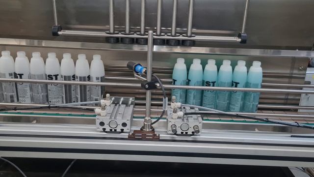 Линия розлива пенящихся продуктов с погружением носиков до дна флакона. Спрей термозащита