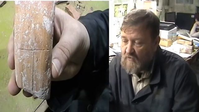 Крест на ручке кувшина XIV века с раскопа по улице Толст