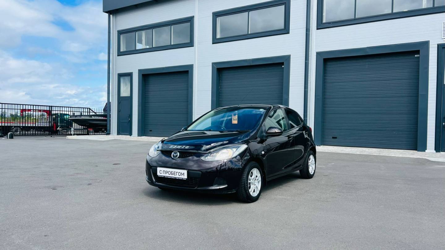 Mazda Demio, 2009 год
