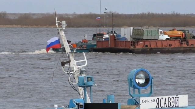 ПЕРЕПРАВА АВТОМОБИЛЬНОЙ ТЕХНИКИ НА БАРЖЕ