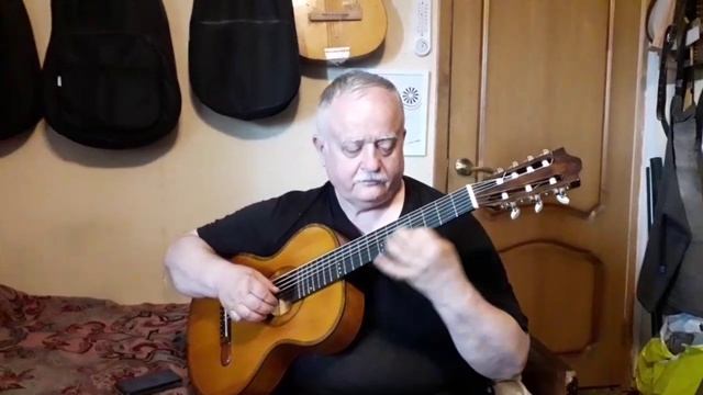проба отреставрированной гитары