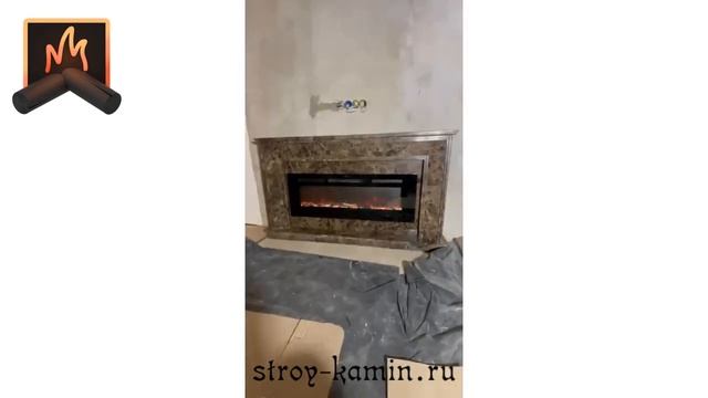 Большой электрический камин Dimplex в мраморном портале по авторскому проекту и установкой под ключ