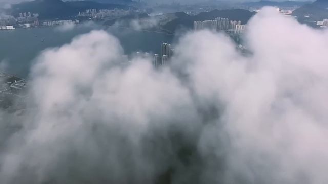 Drone in clouds with City view Free stock footage Free HD Videos - no copyright