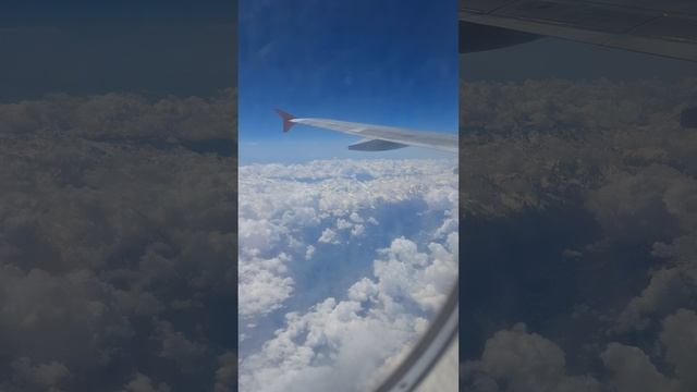Кавказские горы из окна самолёта