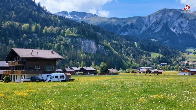 Весенняя прогулка по живописной сельской местности Швейцарии: завораживающая природа и виды на горы