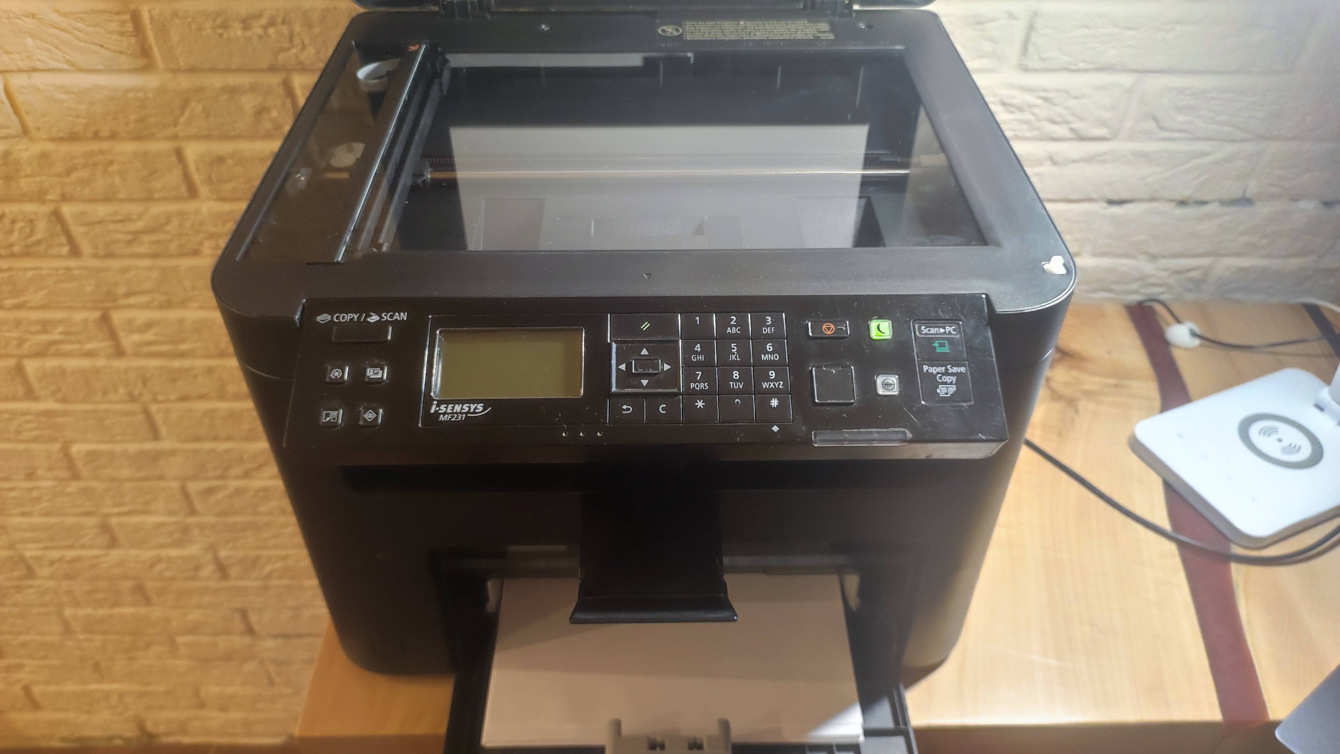 Принтер МФУ Canon MF-231 i-sensys в работе