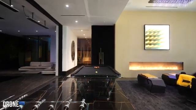 $35 Million - Modern Mansion with Glass Bottom Pool - DroneHub