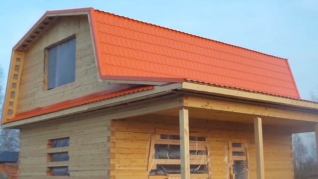 Дом из бруса 6х9 с мансардой и верандой в Тюмени.