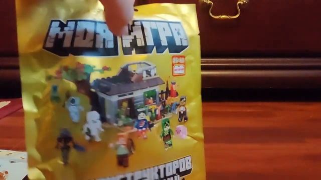 Распаковка трёх неоригинальных пакетиков  lego minecraft, я ?