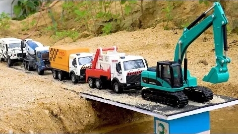 Постройте мост из цветных блоков игрушечных строительных машин с экскаватором и самосвалами