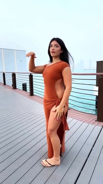 0TvkHfrYhh0 - Trendy orange tight thigh dress summer outfit for a vacation #fashion #style #outfit #