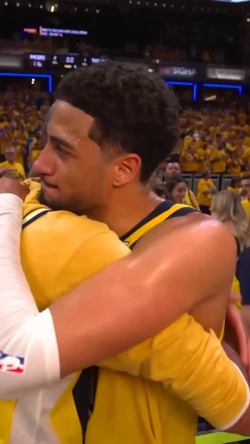Reggie Miller & Tyrese Haliburton hug after Game 3 finals win