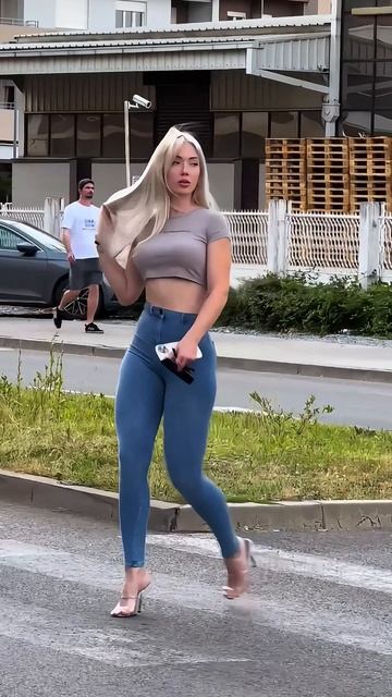 v_eNUoMeML8 - Stunning blue tight jeans with gray top street fashion style #fashion #style #outfit #
