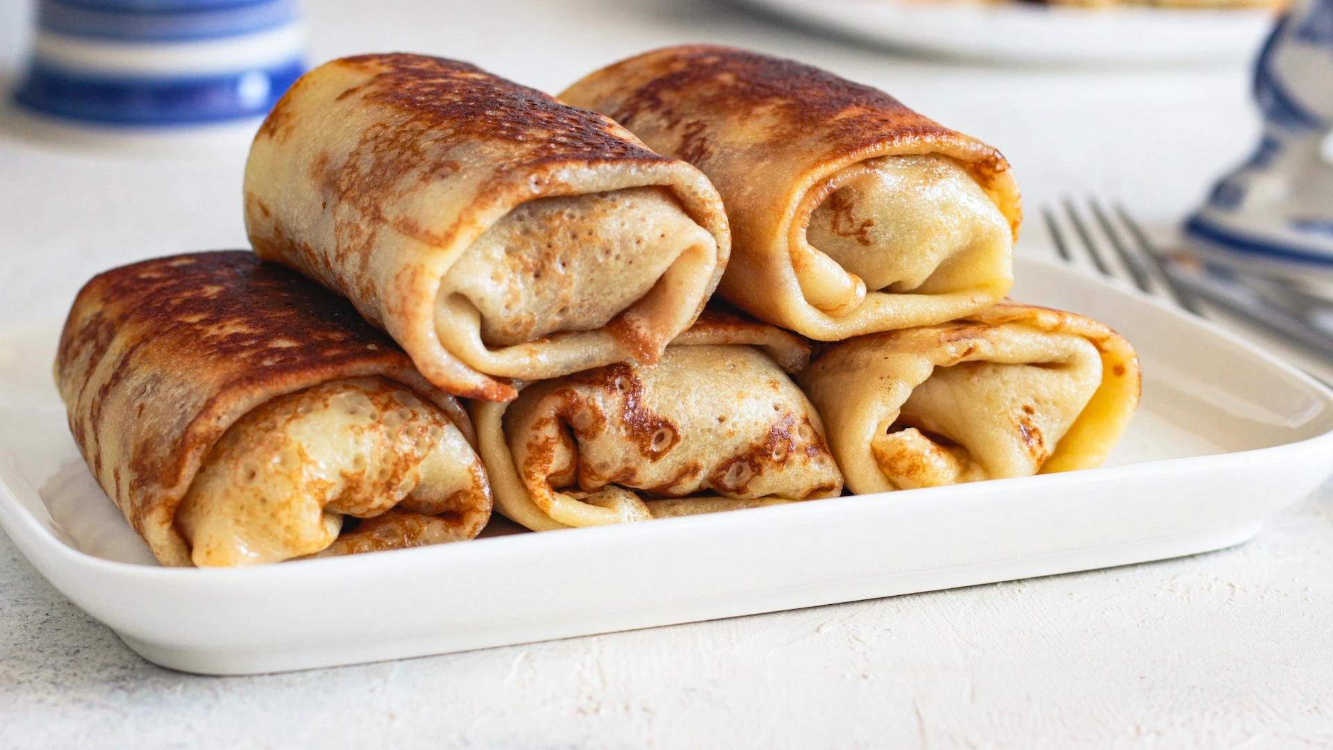 Тонкие блинчики с мясной начинкой