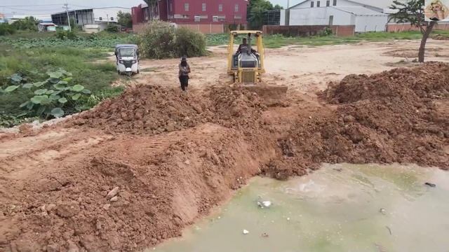 Строительство, утопили два самосвала, засыпка