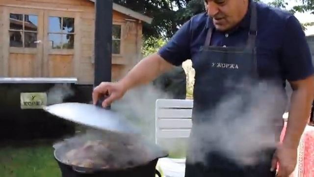 Рулька, жаренная на решетке ,после приготовления в казане на костре. Рецепт от Жоржа