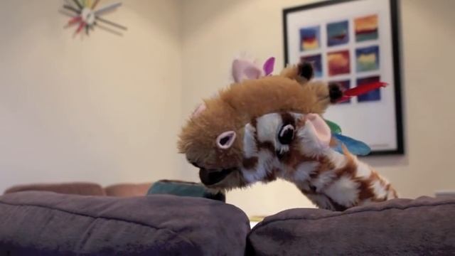 Geraldine the Giraffe learns ear sound