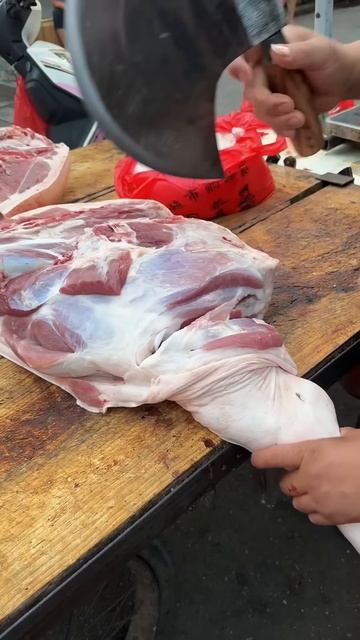 Cutting beef using an axe #shorts