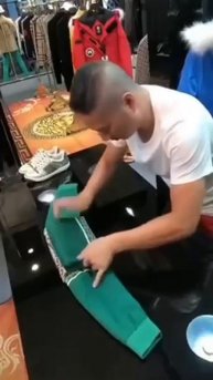 How to fold a hoodie