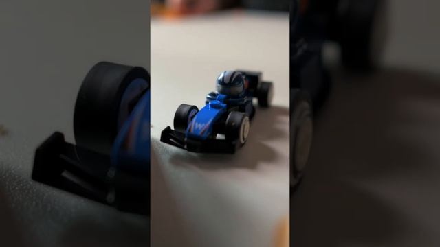 ПРОДОЛЖАЕМ РАСПАКОВЫВАТЬ ЛЕГО ФОРМУЛУ 1 F1