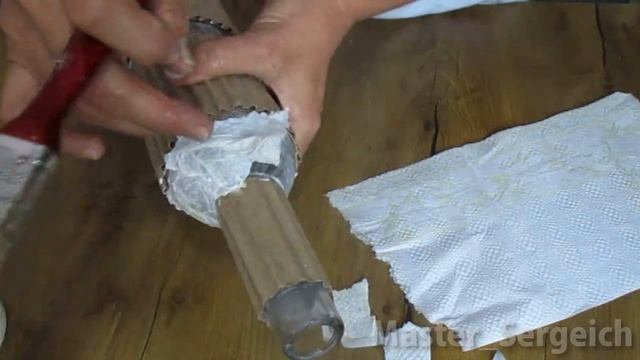I took a bottle and cardboard and this is what came out! Check out how stylish and frugal it is!