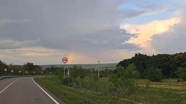 Радуга после сильного града и ливня