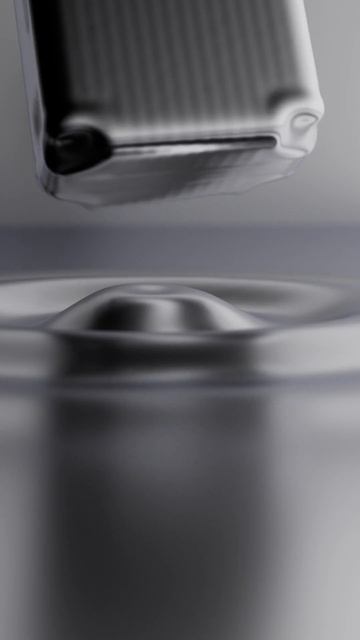 36) Rimowa Liquid Suitcase - Houdini & Redshift
