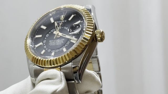 Rolex 
SKY-DWELLER 42MM STEEL AND YELLOW