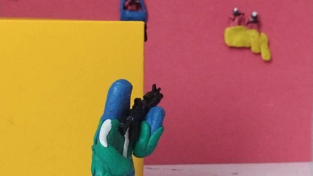 Игра в кальмара из пластилина.