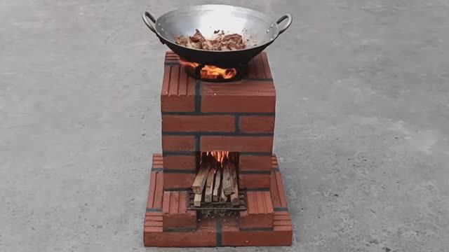 Бездымная эффективная печь Ракета из кирпича и цемента