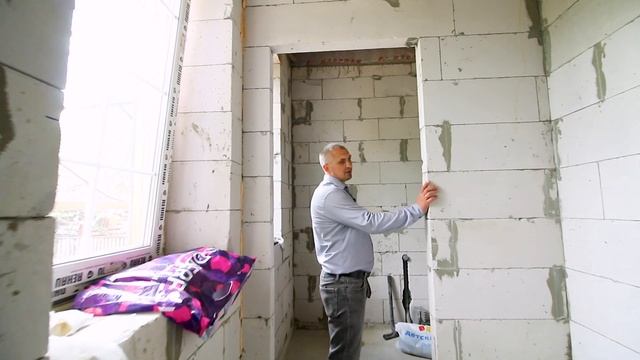 Двухэтажный дом из газобетона. Отделка дома японскими фасадами.