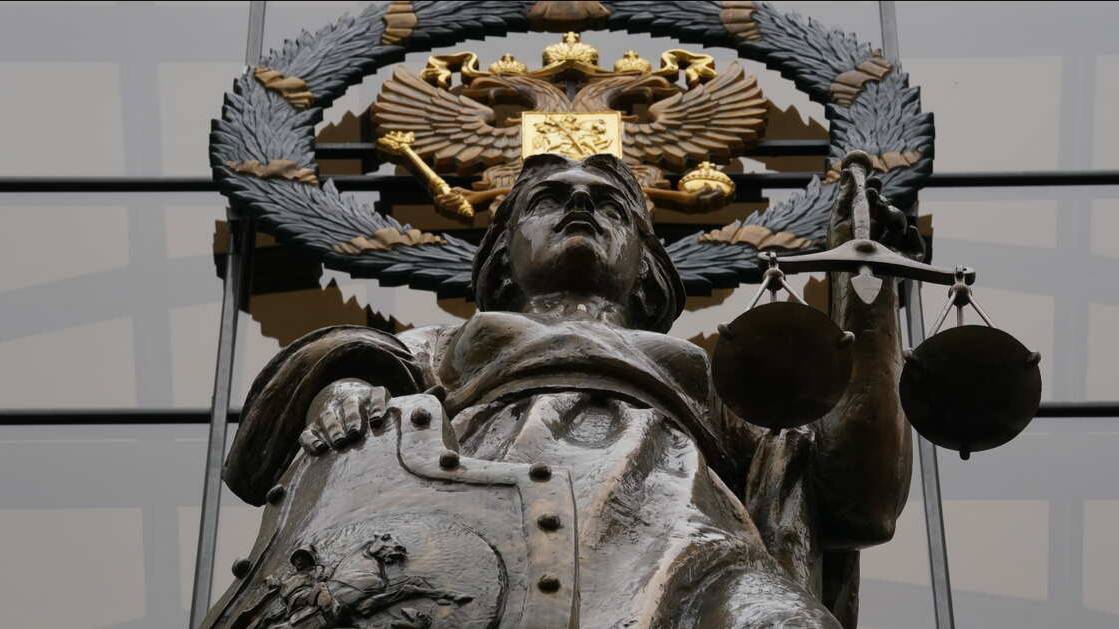 Нарисовавшим пентаграмму на двери военкора Трушнина запросили лишение свободы