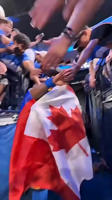 Lu Dort reppin’ his Haitian & Canada flags