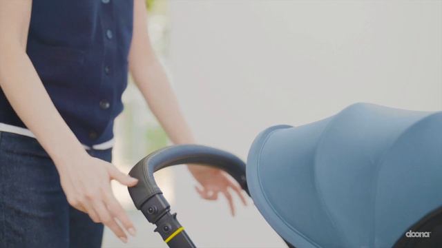 Автокресло Doona X регулировка ручки