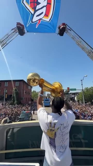 J-Dub hoists the trophy for the fans