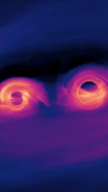 Компьютерная симуляция демонстрирует, что происходит при слиянии двух сверхмассивных черных дыр