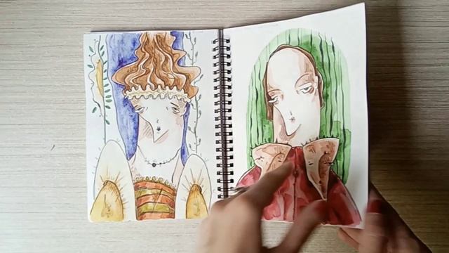 Листаю  законченный скетчбук с четырьмя видами бумаги: маркерной, акварельной, чёрной и крафтовой